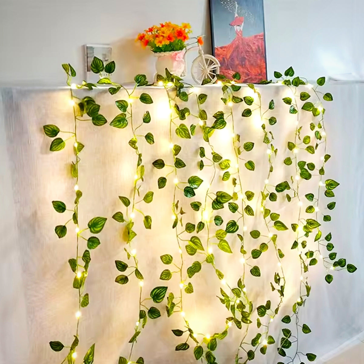 Decorative string lights for the home, battery-operated string lights for Christmas trees, featuring artificial vines, green leaves, and flowers