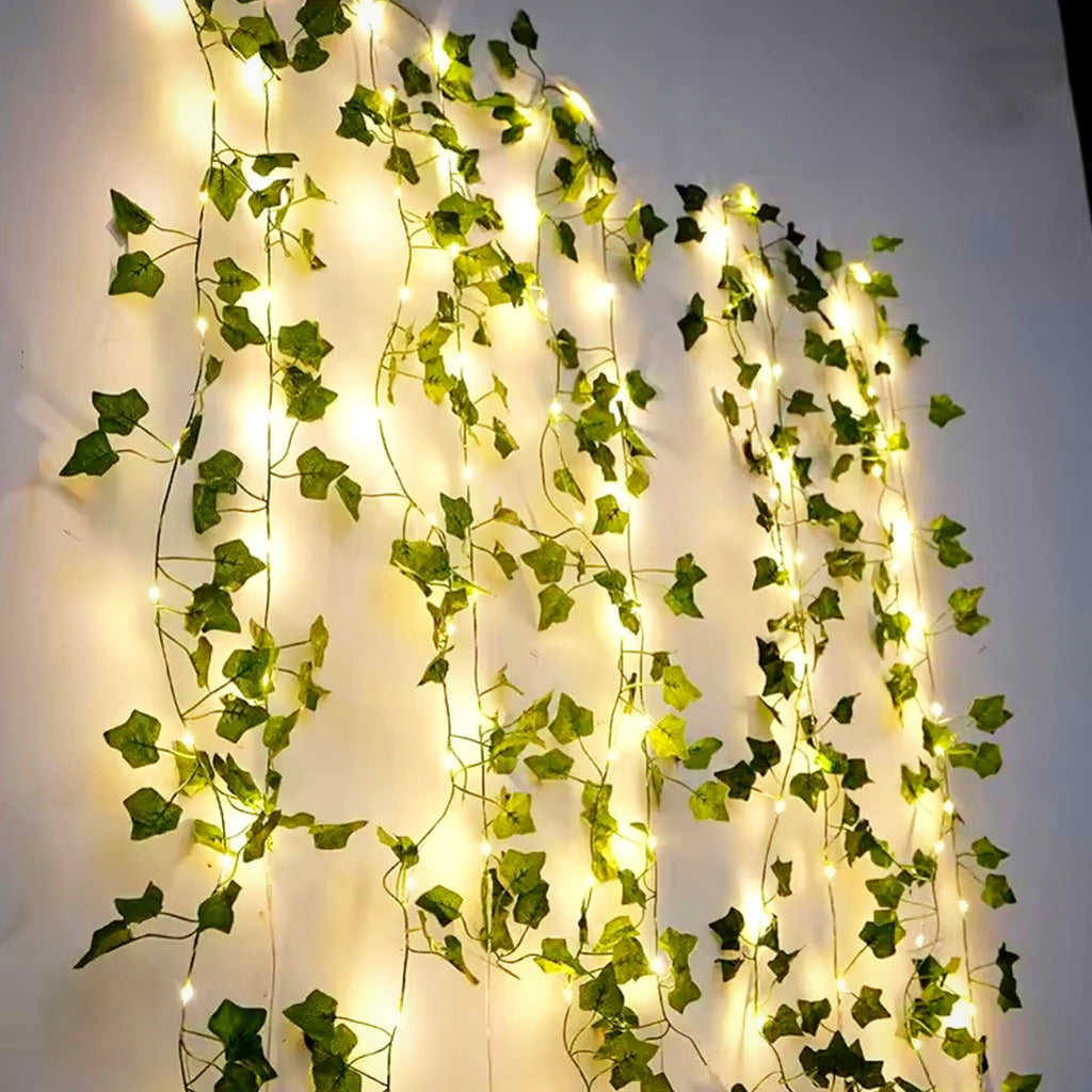 Decorative string lights for the home, battery-operated string lights for Christmas trees, featuring artificial vines, green leaves, and flowers